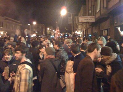 Stars and Stripes being paraded through the crowds on...